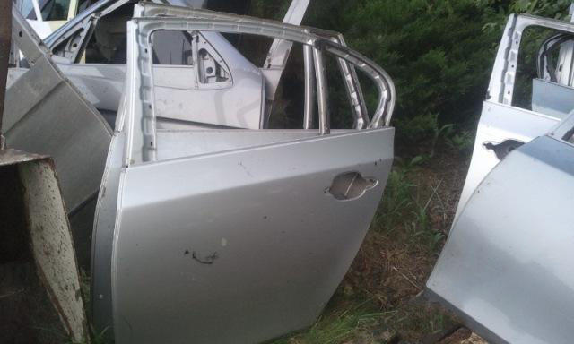 BMW E61 E-61 tylne lewe drzwi srebrne