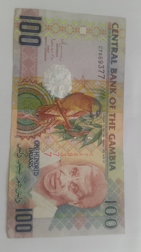 Banknot 100 dalasis Gambia.