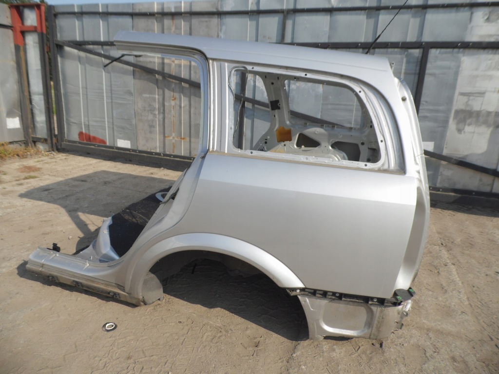 BŁOTNIK LEWY TYŁ TYLNY OPEL ASTRA G II Z147 KOMBI