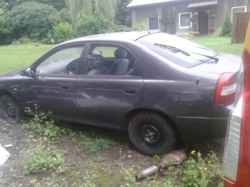 DRZWI KLAPA BŁOTNIK KIA SHUMA ĆWIARTKA LAMPA SZYBA