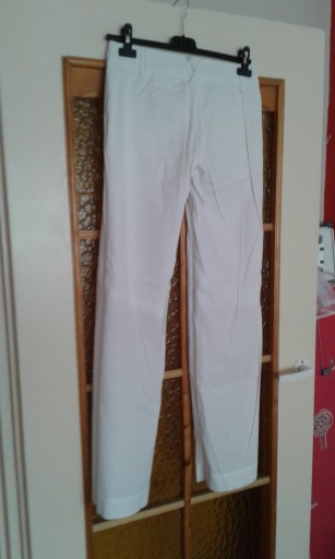 Zdjęcie oferty: Spodnie białe rozszerzane dlugie materiałowe
