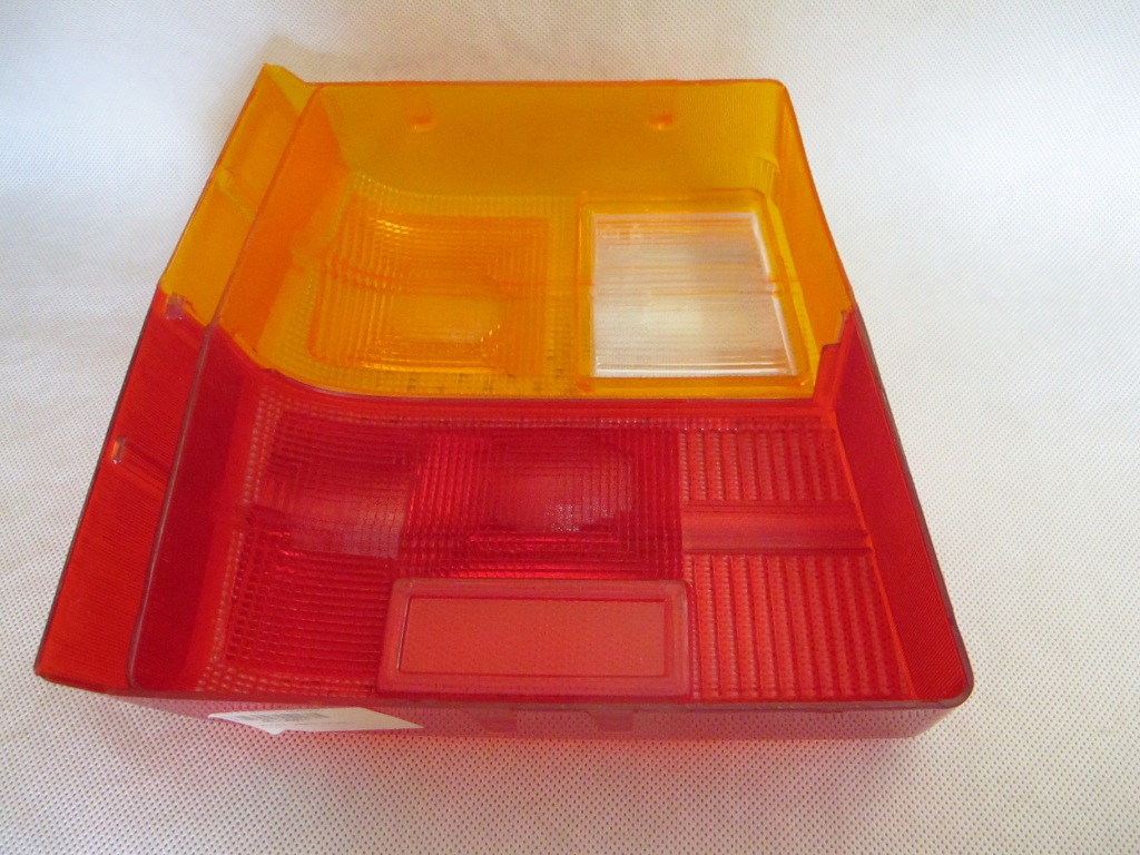 Стекло фары лампы правый задний  fiat uno -89 lla571 новый Недорого