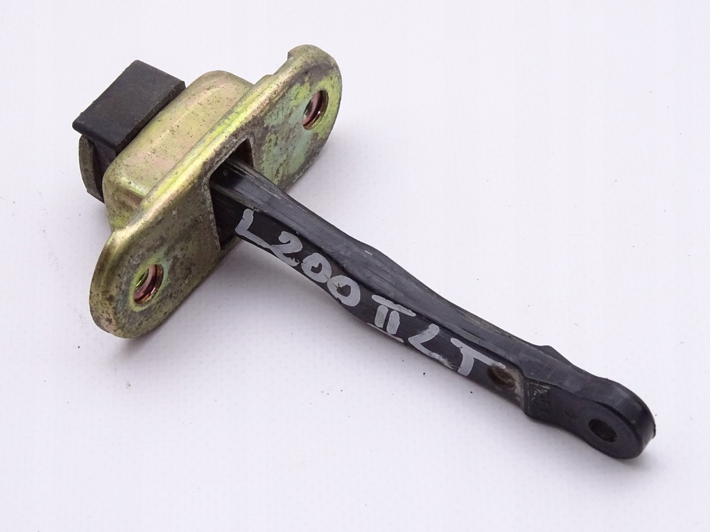 фото №1, Mitsubishi l200 96-06 обмежувач двері лівий задня